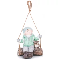 Figura MagicHome, karácsonyi, fiú hintán bagollyal, függő, kerámia, 34,5x25,5x39,5 cm